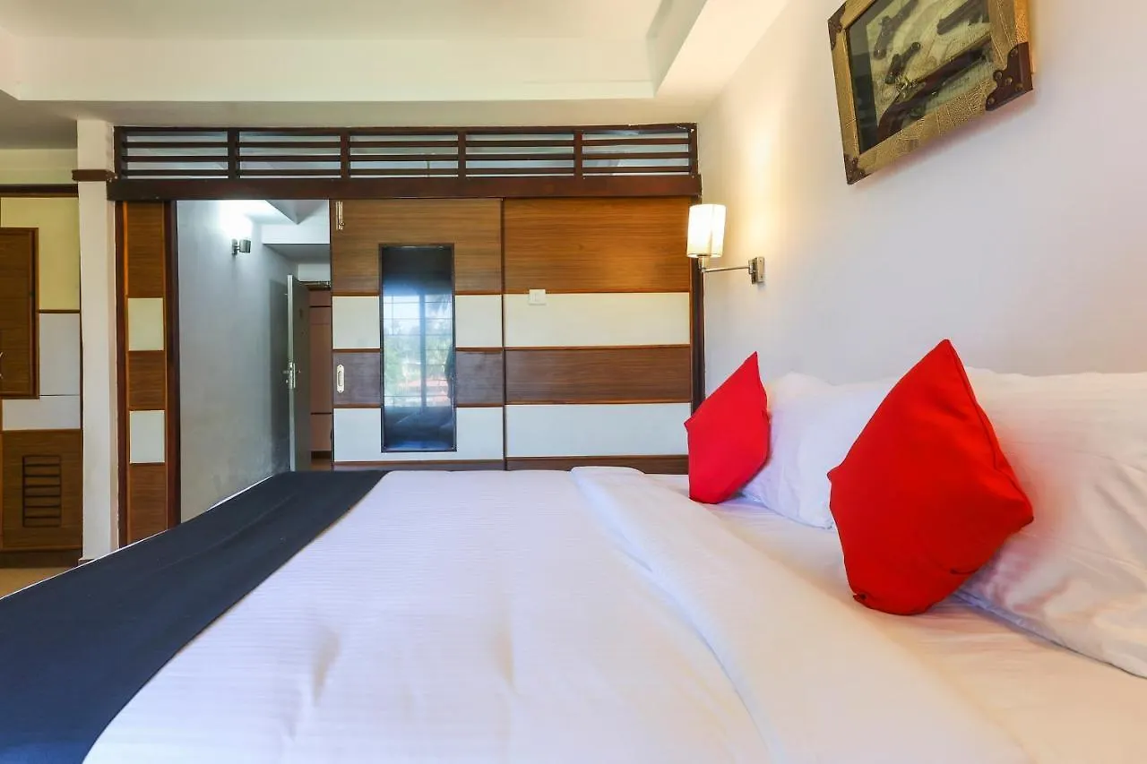 Capital O 68980 Hotel Souparnika Kollam