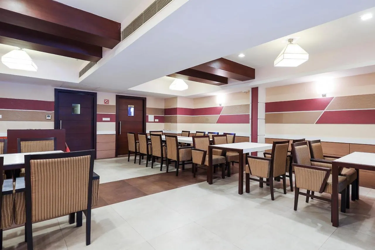 Capital O 68980 Hotel Souparnika Kollam